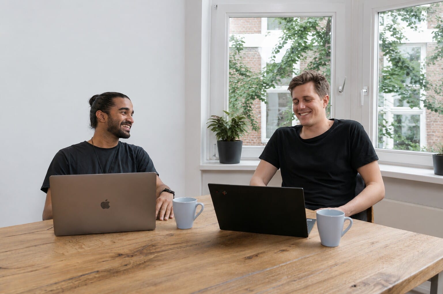 Two colleagues working side by side